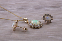 Load image into Gallery viewer, Oval cut Opal Earrings with Matching Necklace set in Yellow Gold