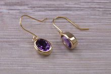 Load image into Gallery viewer, Natural Oval cut Amethyst dropper earrings, set in solid 9ct Yellow gold