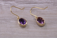 Load image into Gallery viewer, Natural Oval cut Amethyst dropper earrings, set in solid 9ct Yellow gold