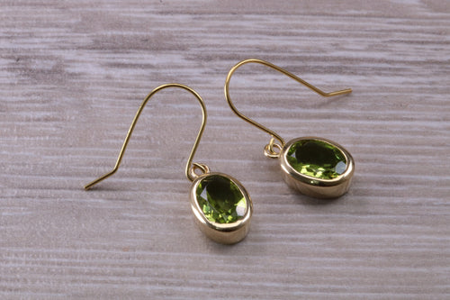 Natural Oval cut Peridot dropper earrings, set in solid 9ct Yellow gold