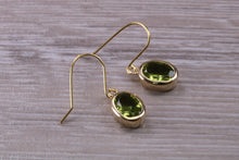 Load image into Gallery viewer, Natural Oval cut Peridot dropper earrings, set in solid 9ct Yellow gold