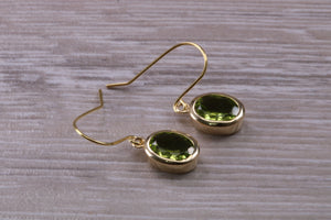 Natural Oval cut Peridot dropper earrings, set in solid 9ct Yellow gold