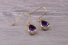 Load image into Gallery viewer, Tear drop cut Amethyst set Dropper Earrings set in Yellow gold