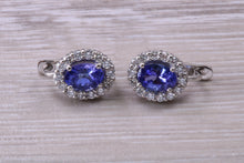 Load image into Gallery viewer, Two carat Tanzanite and Diamond set Earrings