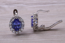 Load image into Gallery viewer, Two carat Tanzanite and Diamond set Earrings