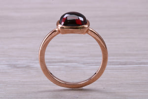 Cabochon cut Garnet set Rose Gold Solitaire