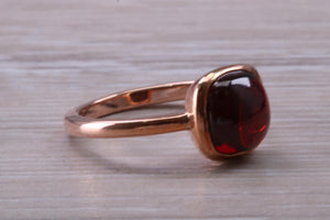 Cabochon cut Garnet set Rose Gold Solitaire