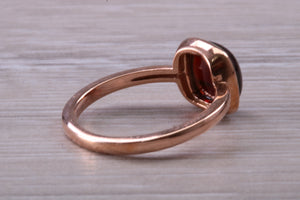 Cabochon cut Garnet set Rose Gold Solitaire