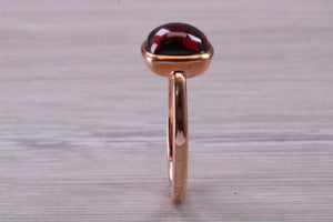 Cabochon cut Garnet set Rose Gold Solitaire