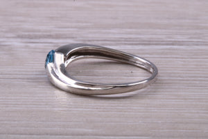 Round cut Blue Topaz set White Gold Ring