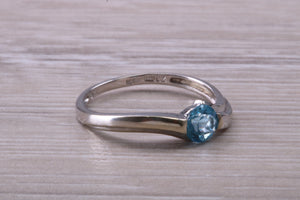 Round cut Blue Topaz set White Gold Ring