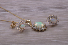 Load image into Gallery viewer, Oval cut Opal Earrings with Matching Necklace set in Yellow Gold