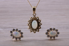 Load image into Gallery viewer, Oval cut Opal Earrings with Matching Necklace set in Yellow Gold