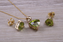 Load image into Gallery viewer, Trillion cut Peridot Earrings and Matching Necklace set Yellow Gold