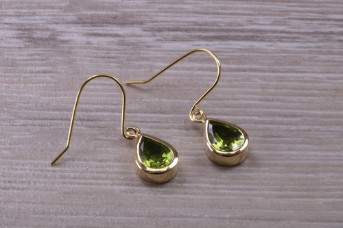 Tear Drop cut Peridot set Dropper Earrings set in Yellow gold