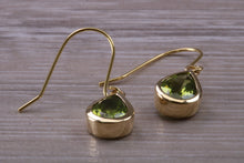 Load image into Gallery viewer, Tear Drop cut Peridot set Dropper Earrings set in Yellow gold