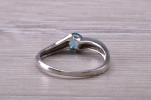 Round cut Blue Topaz set White Gold Ring