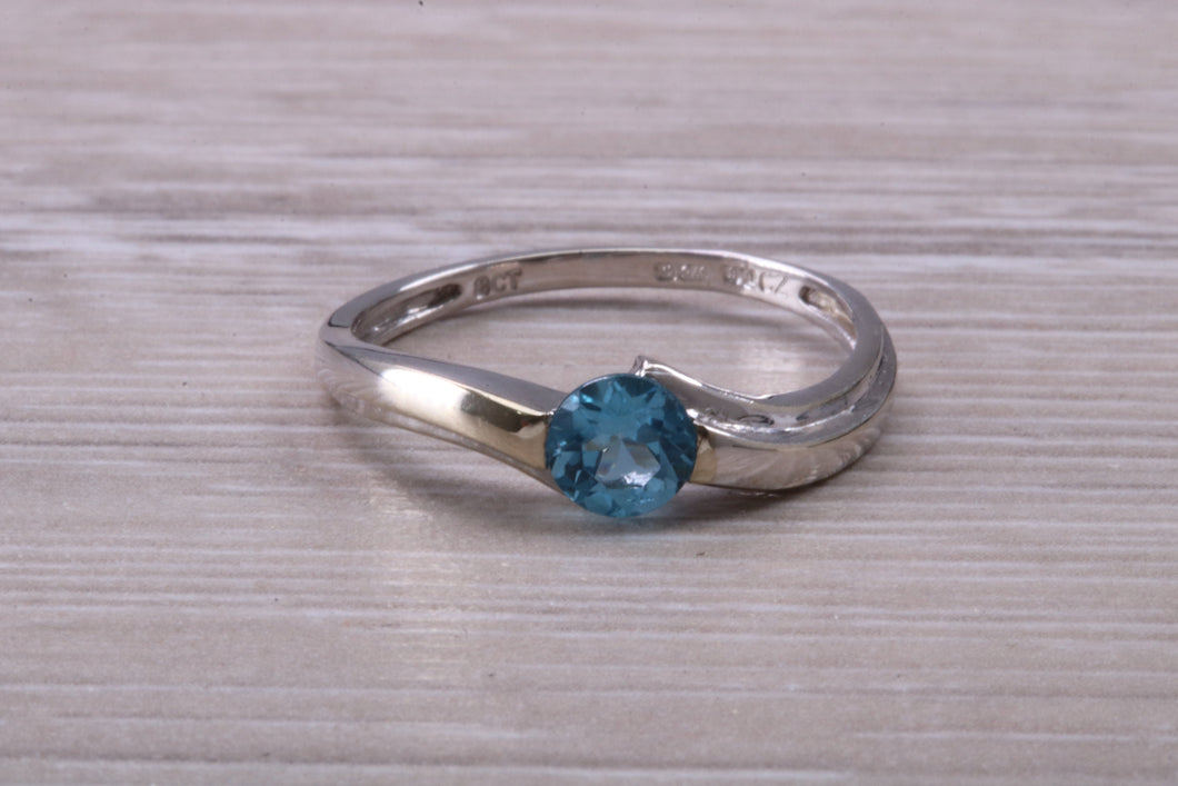 Round cut Blue Topaz set White Gold Ring