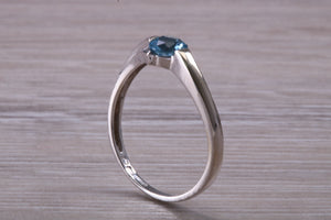 Round cut Blue Topaz set White Gold Ring