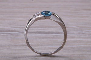 Round cut Blue Topaz set White Gold Ring