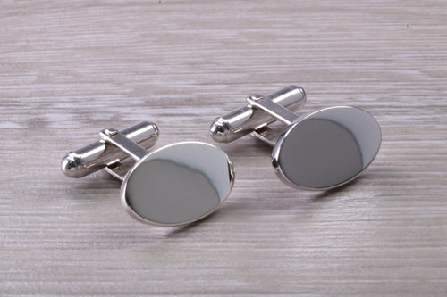 Gentleman's Cufflinks. Oval profile, made from solid sterling silver traditional cufflinks with swivel back fittings.