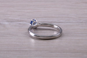 Half carat Blue Sapphire set White Gold Solitaire