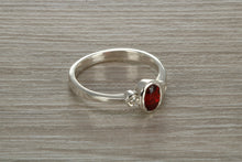 Load image into Gallery viewer, Sterling Silver Garnet C Z Trilogy Ring