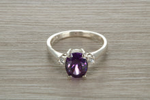Load image into Gallery viewer, Sterling Silver Amethyst C Z Trilogy Ring
