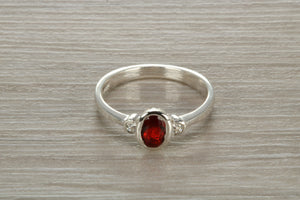 Sterling Silver Garnet C Z Trilogy Ring