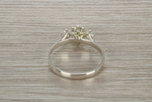 Load image into Gallery viewer, Sterling Silver Peridot C Z Trilogy Ring