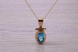 Beautiful Oval cut Swiss Blue Topaz set Yellow Gold Necklace