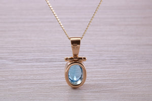 Beautiful Oval cut Swiss Blue Topaz set Yellow Gold Necklace