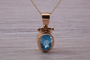 Beautiful Oval cut Swiss Blue Topaz set Yellow Gold Necklace