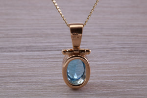 Beautiful Oval cut Swiss Blue Topaz set Yellow Gold Necklace