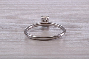 Half carat Emerald Cut Diamond set Solitaire