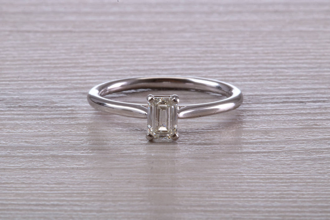 Half carat Emerald Cut Diamond set Solitaire