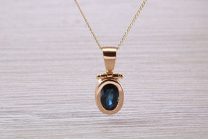 Beautiful One carat Oval cut Blue Sapphire set Yellow Gold Necklace