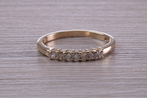 Seven Stone Diamond set Yellow Gold Eternity Ring