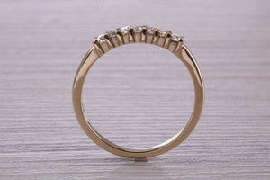 Seven Stone Diamond set Yellow Gold Eternity Ring