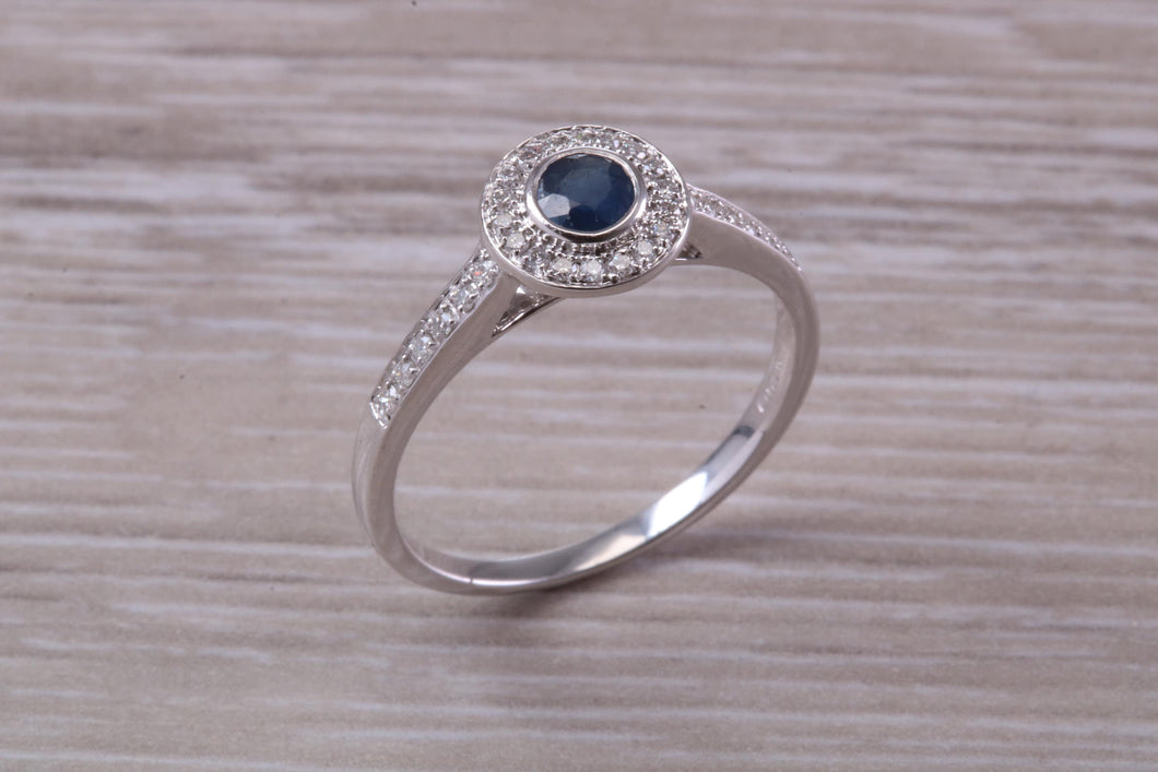 Beautiful Blue Sapphire and Halo set Diamond Ring