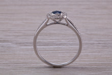 Load image into Gallery viewer, Beautiful Blue Sapphire and Halo set Diamond Ring