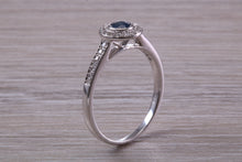 Load image into Gallery viewer, Beautiful Blue Sapphire and Halo set Diamond Ring