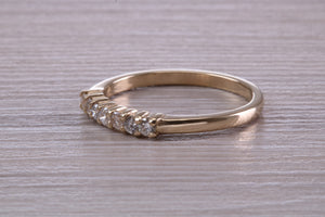 Seven Stone Diamond set Yellow Gold Eternity Ring