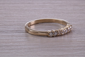 Seven Stone Diamond set Yellow Gold Eternity Ring