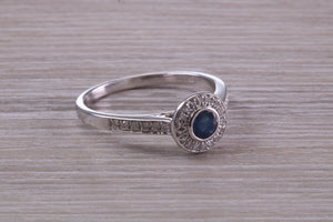 Beautiful Blue Sapphire and Halo set Diamond Ring