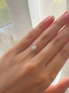 Half carat Emerald Cut Diamond set Solitaire