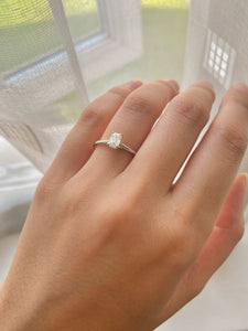 Half carat Emerald Cut Diamond set Solitaire