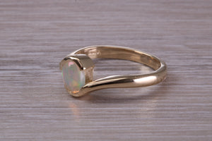 Oval cut Natural Opal set Yellow Gold Ring