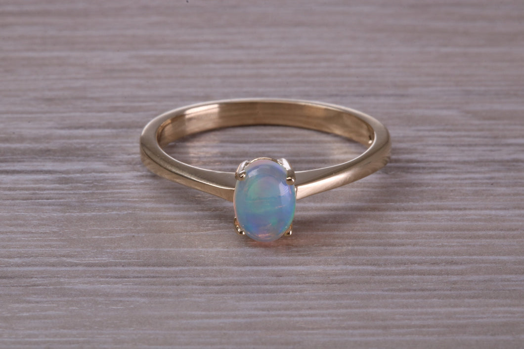 Oval cut Natural Opal set Yellow Gold Ring