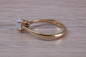 Oval cut Natural Opal set Yellow Gold Ring